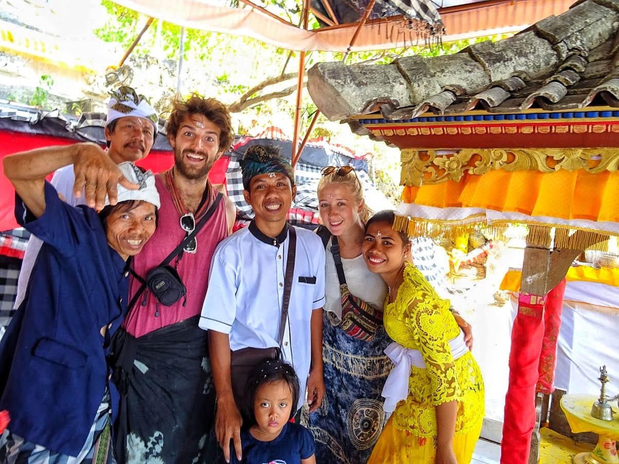 Travellers with local worshippers