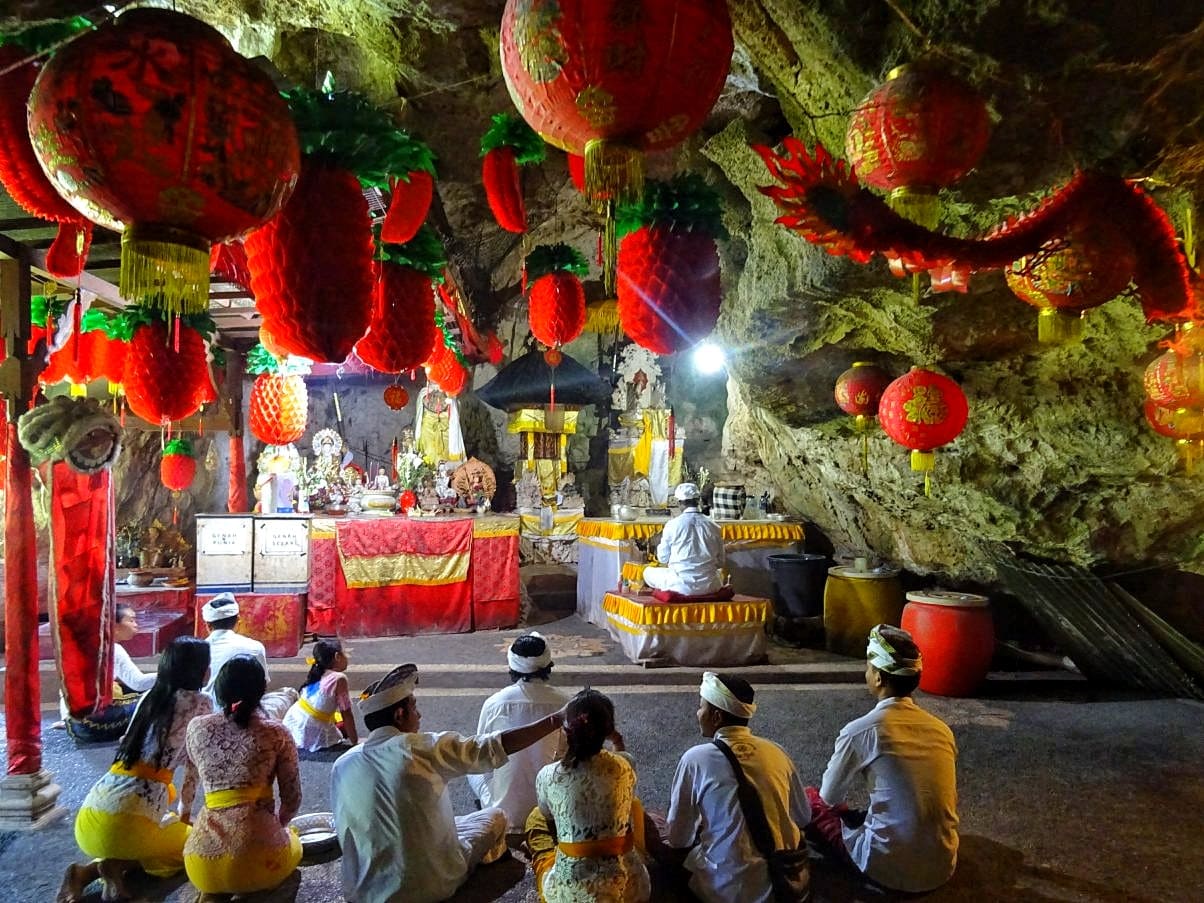 Local worshippers in underground temple