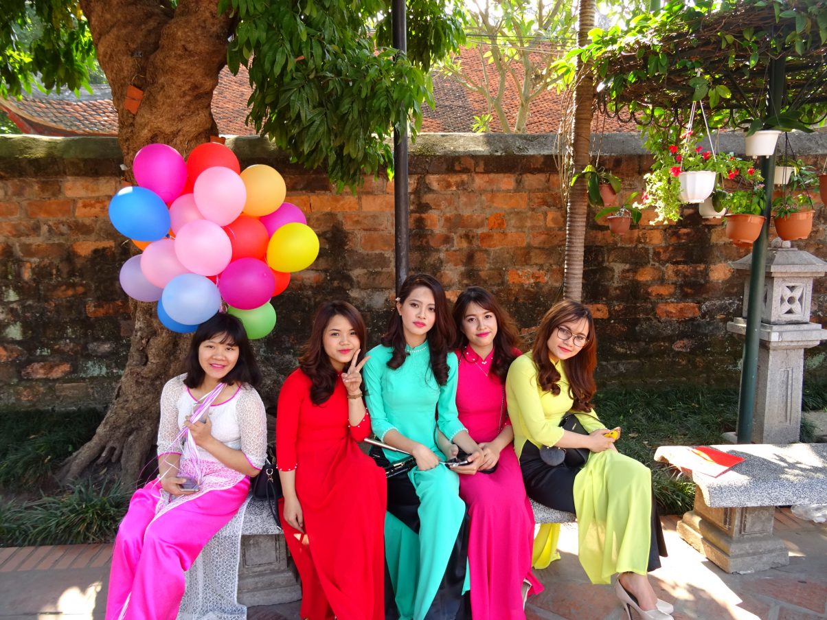 Vietnamese beautiful girls wearing traditional dresses