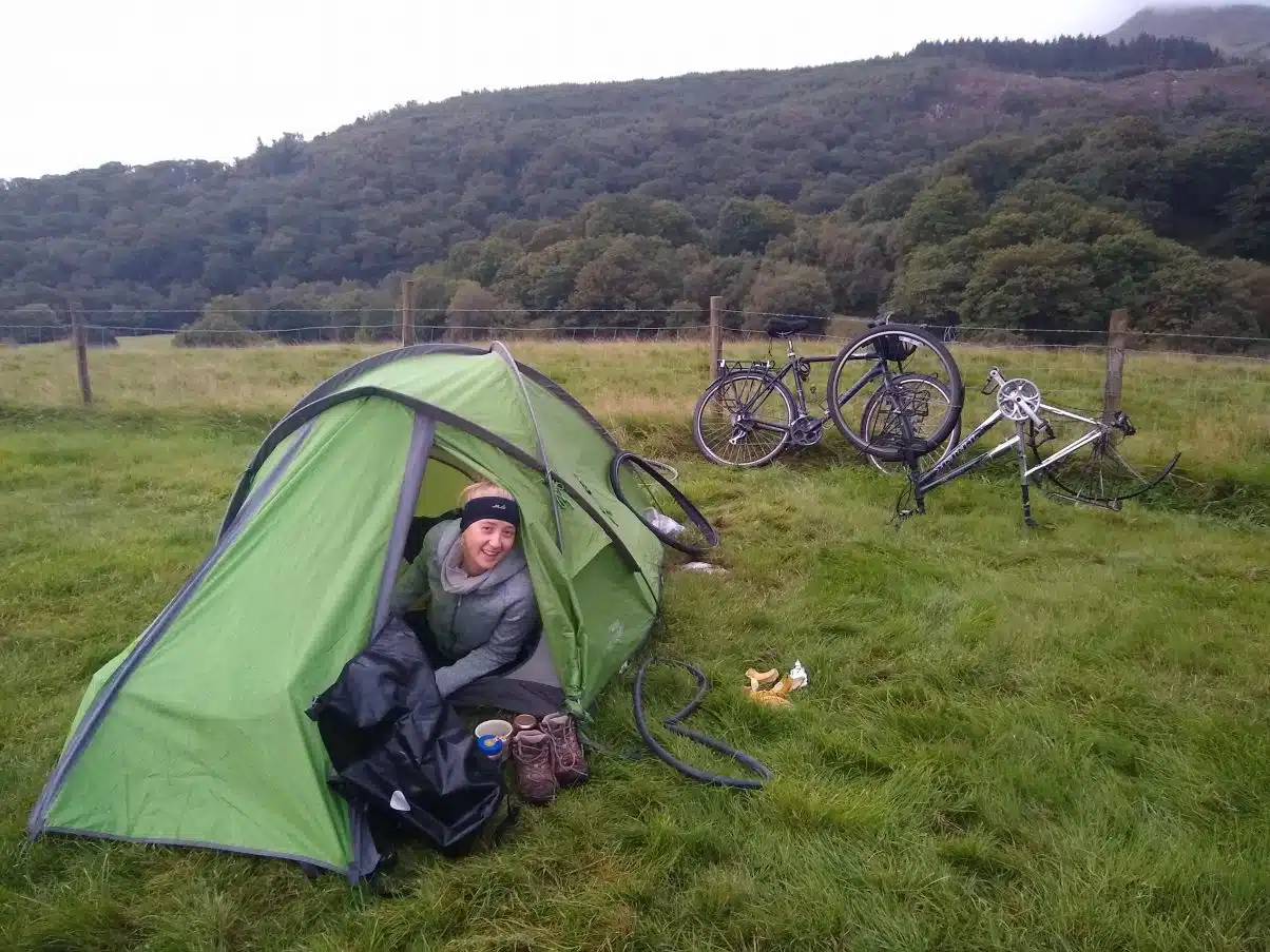 Tent in field camping with bikes