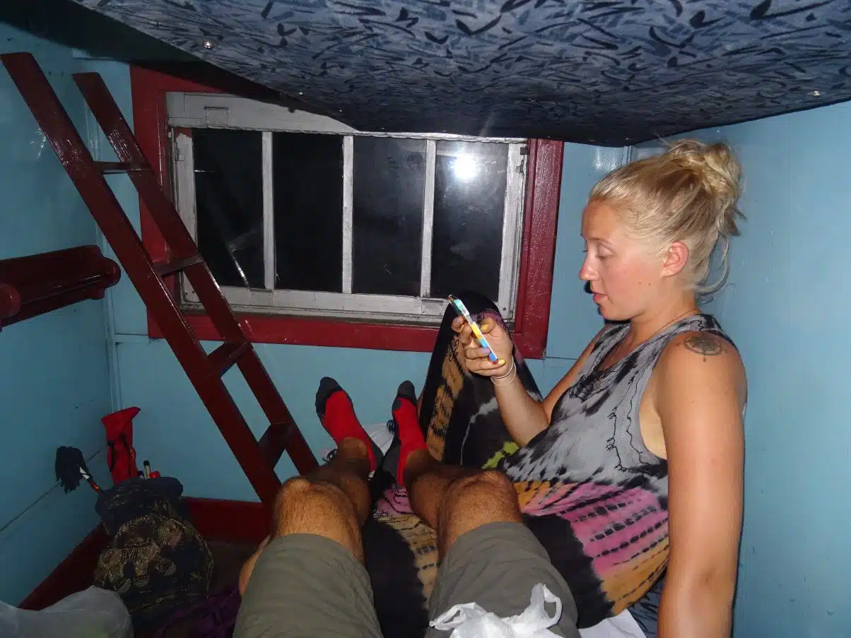 Couple in sleeper train overland travelling 