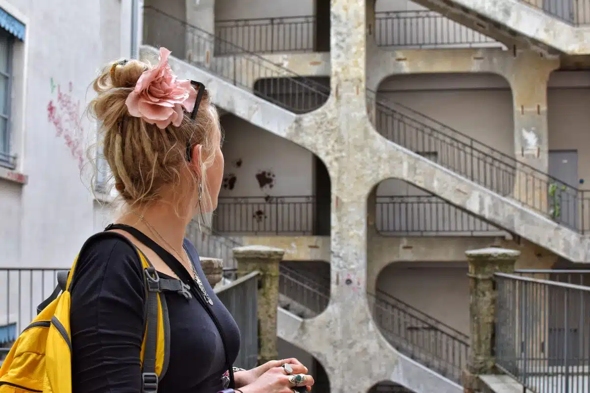 21 Completely Free Things to Do in Lyon, France 7 Girl at the traboules in Lyon