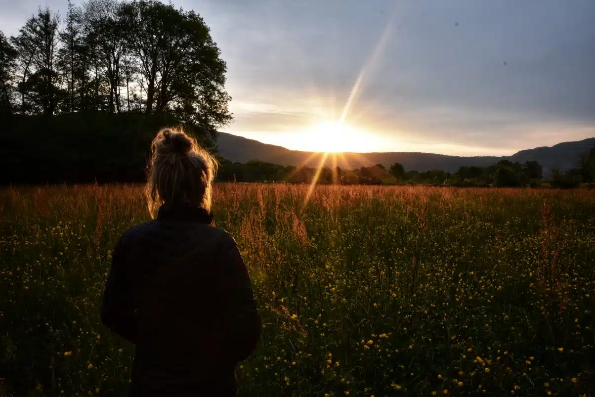 Girl in field camping