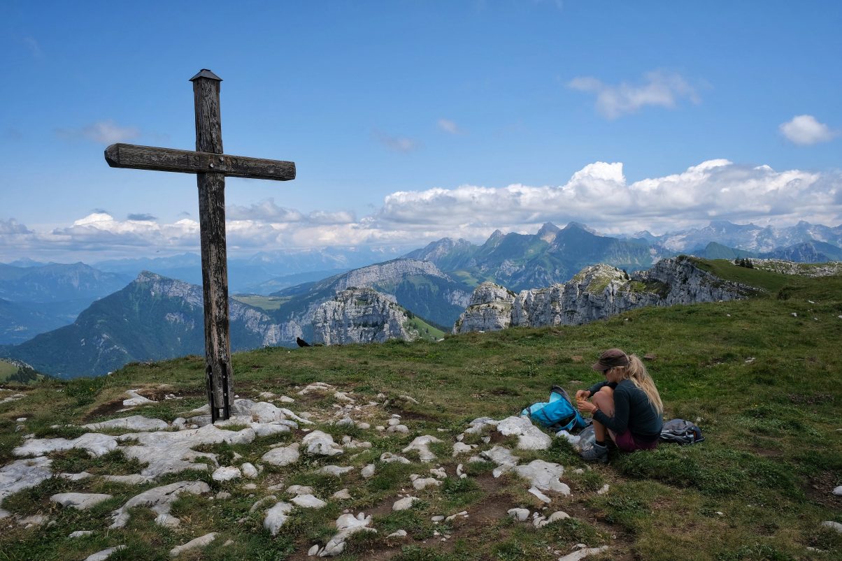 Girl on mountain top eating