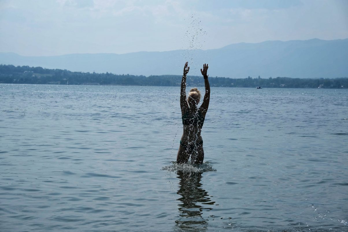 Girl wild swimming 