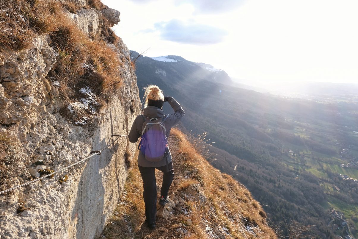 Girl in winter backpacking gear 