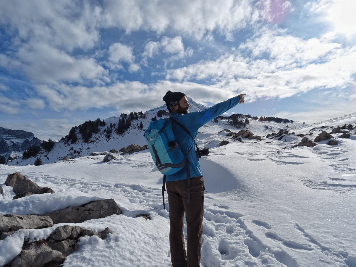 Man hiking in winter 