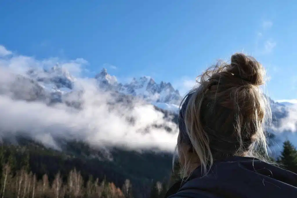 Women looking up to mountain