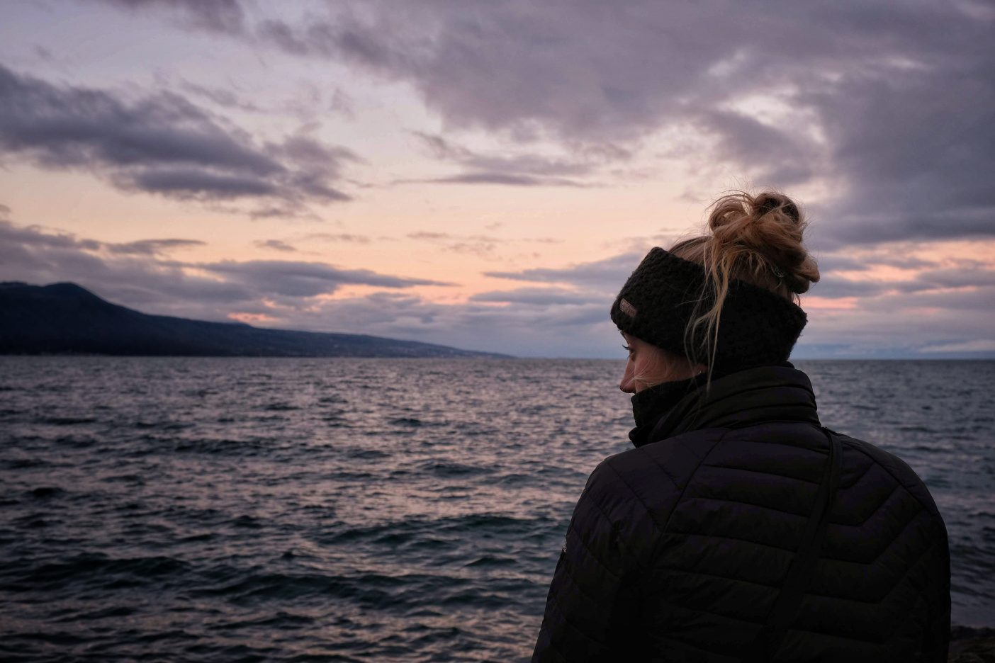 Girl wild swimming in Lac Leman