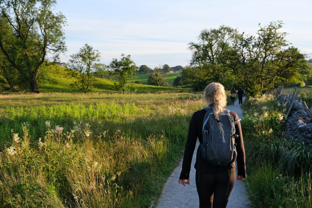 Girl walking on hiking trail