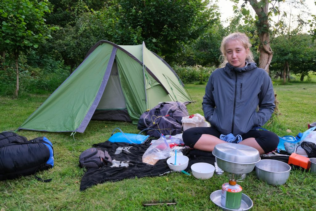 Girl practising zero waste camping 