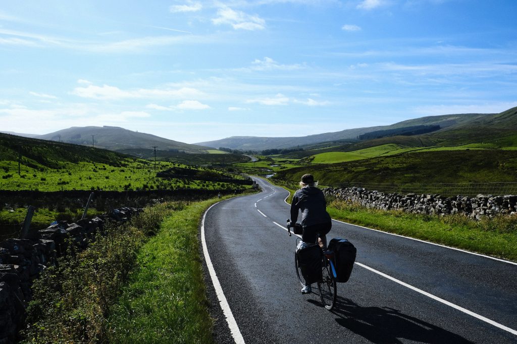 Girl cycling along the Dales Cycleway