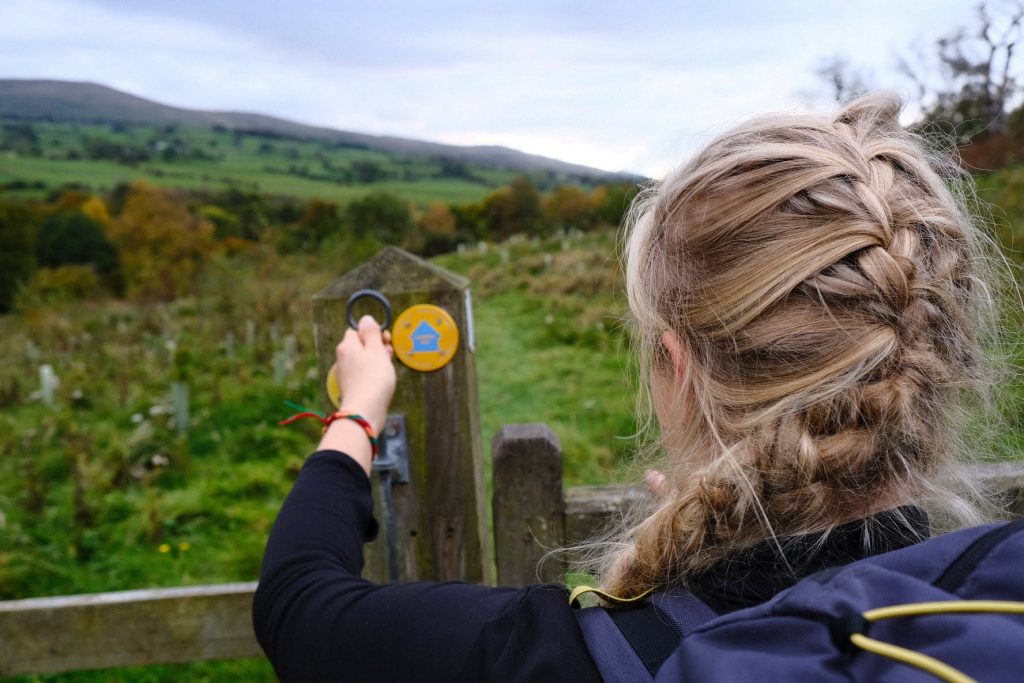 Girl hiking on the Cumbria Way route