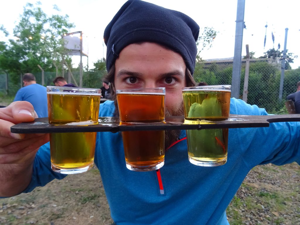 Man holding tray of drinks