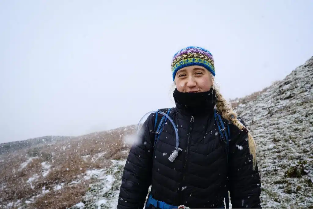 Girl hiking in the snow