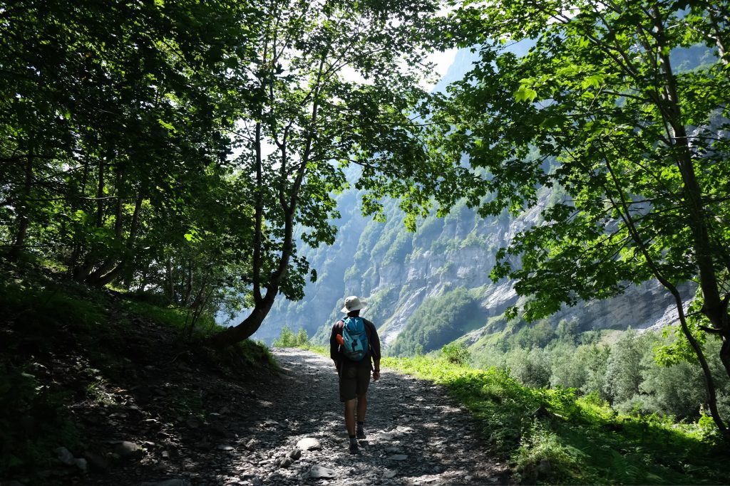 Man hiking through the French Alps