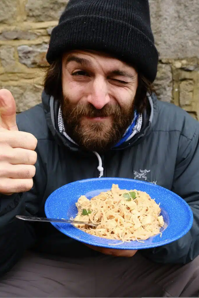 Man eating vegan adventure food