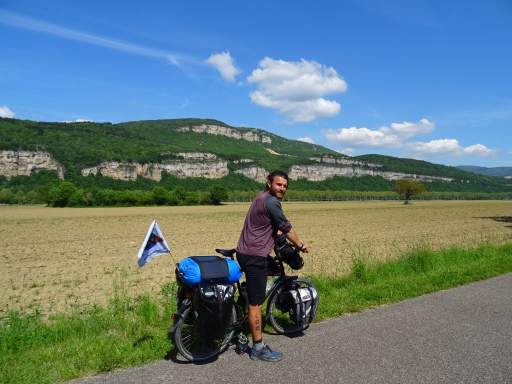 Man cycling in hot climate