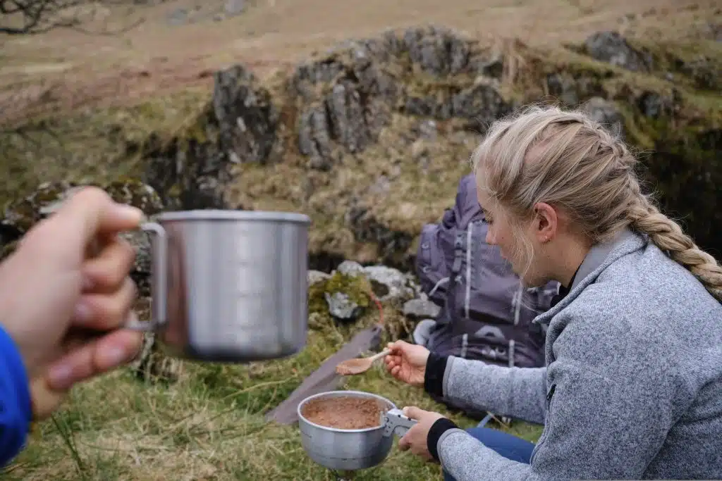 Couple eating a backpacking breakfast