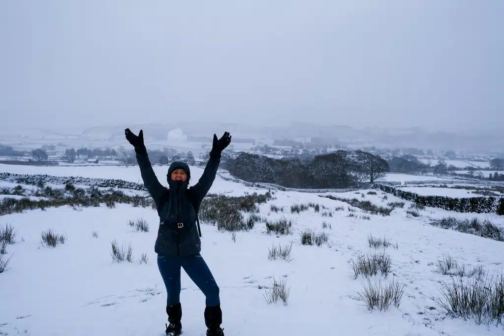 Girl wearing vegan snow gloves